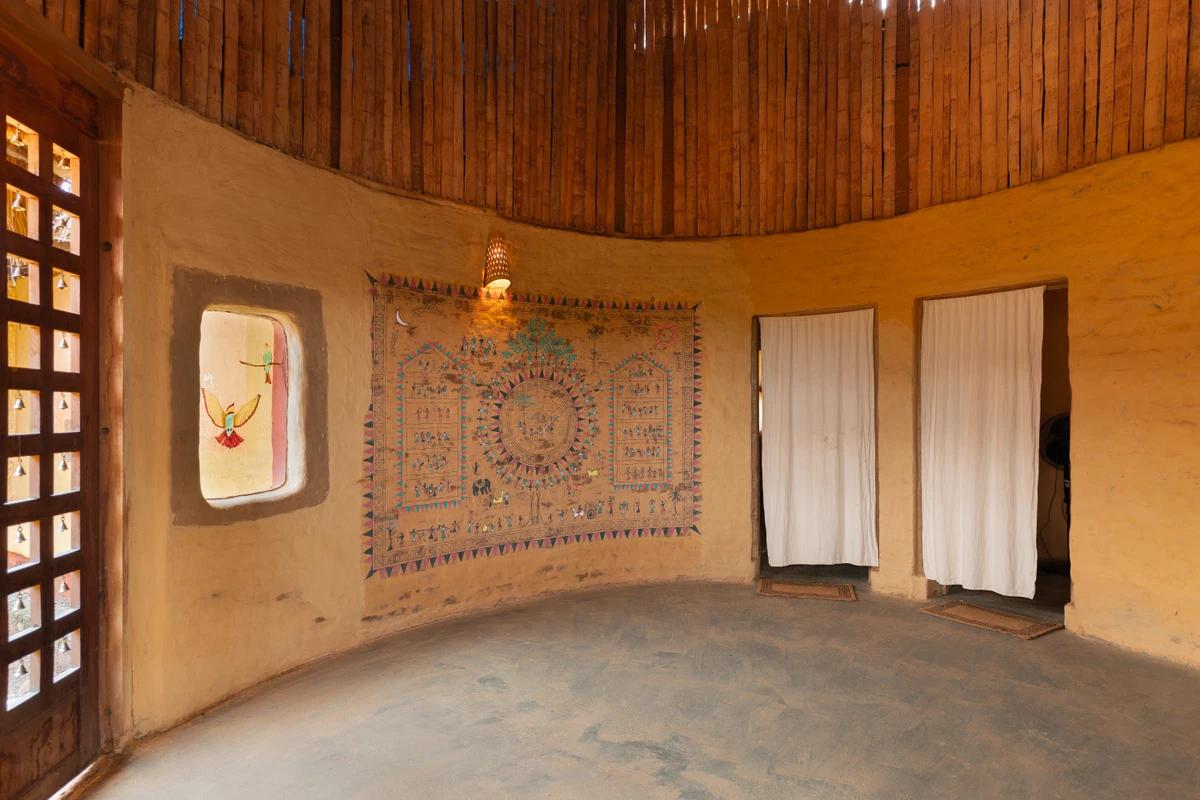 Traditional clay walls and natural cooling design of mud house wayanad villa boCHE 1000 acre resort wayanad