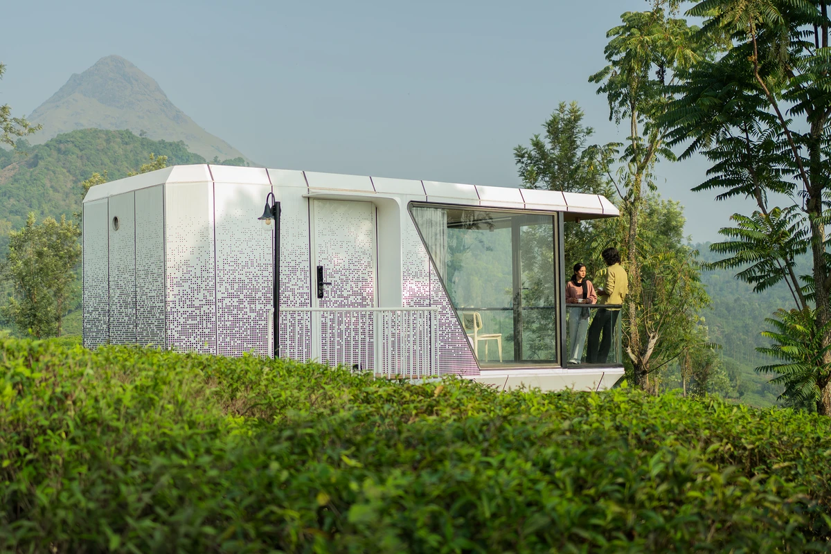 Futuristic xpod wayanad villa exterior with glass front at boCHE 1000 Acres resort in wayanad