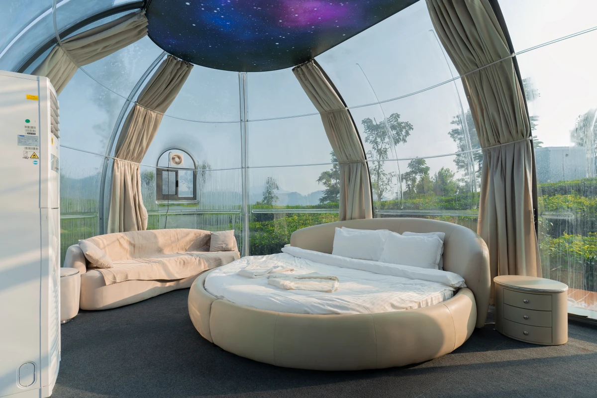 Luxury double bed and intimate atmosphere inside the dome rooms at wayanad