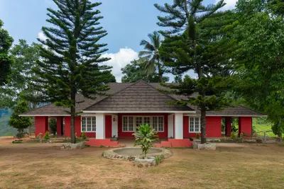 British Bungalow Elegant heritage british bungalow wayanad exterior facade at boCHE 1000 Acres resort
