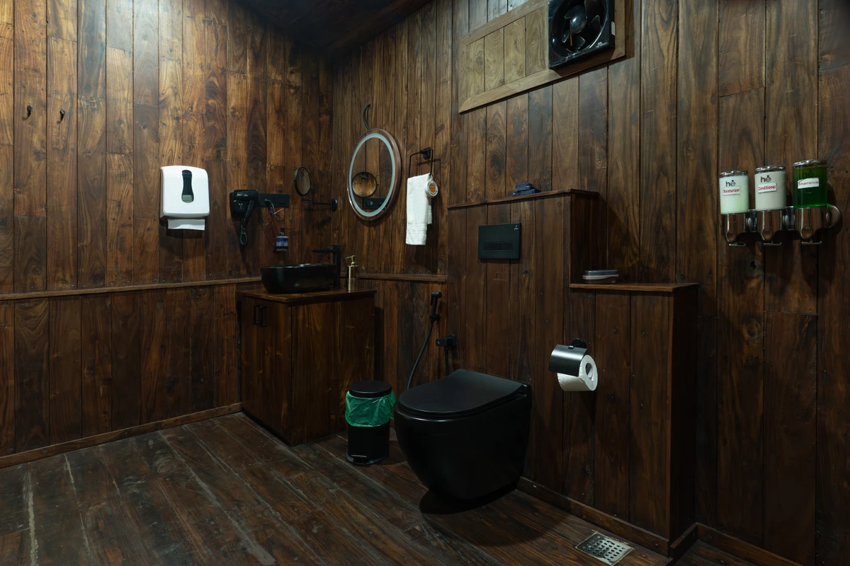 Premium Cabin Bathroom Interior Premium cabin bathroom interior at boCHE 1000 Acre resort, offering a luxury stay in Wayanad.